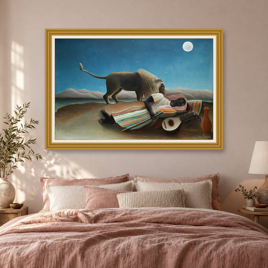 The Sleeping Gypsy by Henri Rousseau — ornate gold frame, bedroom mockup