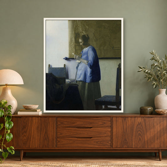 Woman in Blue Reading a Letter by Johannes Vermeer — framed room mockup