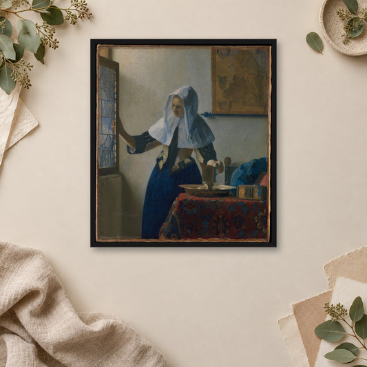 Young Woman with a Water Pitcher by Johannes Vermeer — framed room mockup